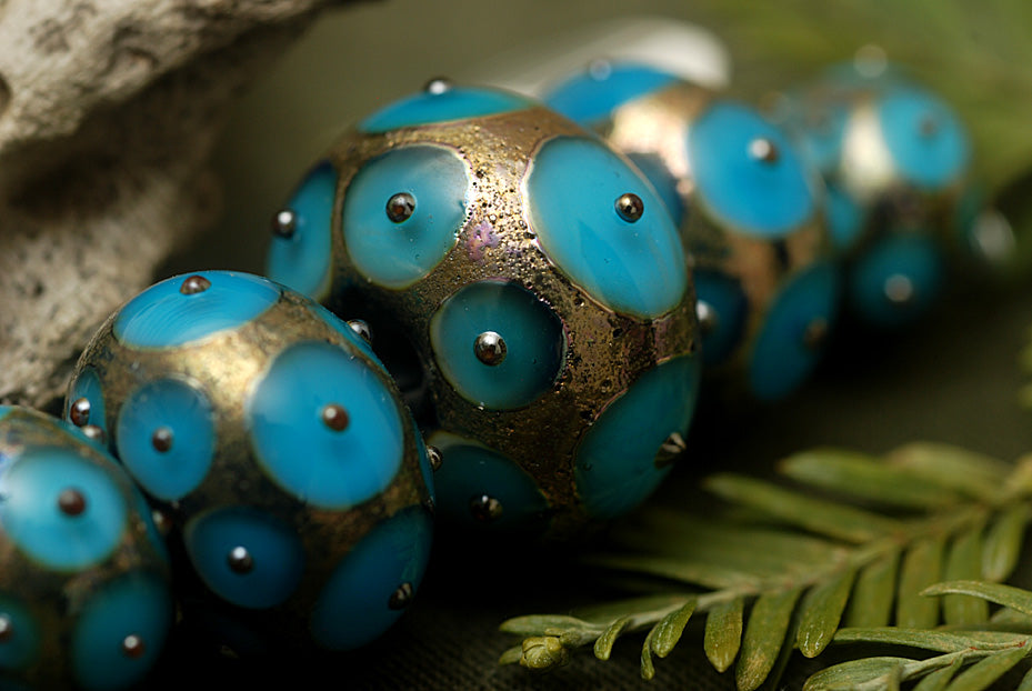 10409011 - Five Teal Blue w/Metal Dots Graduated Rondelle Beads